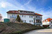Dachgeschosswohnung mit Balkon - 