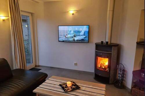 Wohnzimmer mit Kamin - 