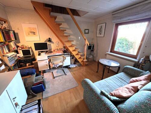 Wohnraum OG mit Treppenaufgang DG - 