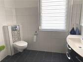 Bad I mit ebenerdiger Dusche - 