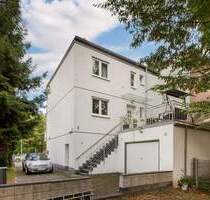 Attraktives Wohnen und Vermieten - Maisonettewohnung mit Ladenlokal in Köln-Vingst