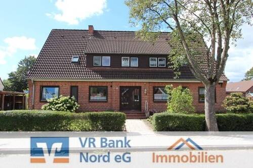 Bild 1 - Gemütliche 2-Zimmer-Eigentumswohnung mit Garten und Carport in schöner Lage