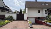Einfahrt und Garage - Einfamilienhaus mit 170,00 m&sup2; in Garbsen zum Kaufen