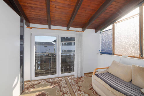 Zimmer / Wintergarten DG - 