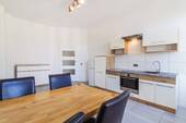 Küche - Modern möblierte Wohnung zu verkaufen
