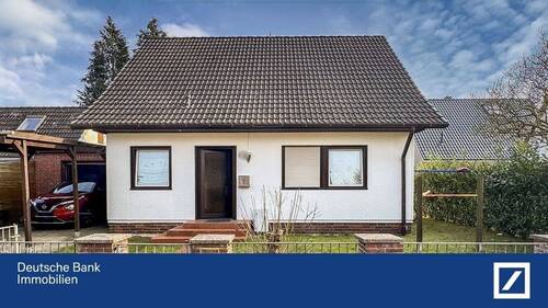 Ansicht - Gemütliches Einfamilienhaus mit solidem Mietertrag - Ihre Investition in eine sichere Zukunft