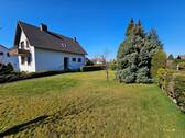 Seitenansicht mit Grundstück - Einfamilienhaus mit 115,00 m² in Unkel zum Kaufen