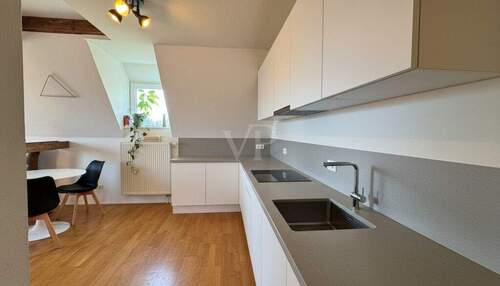 offene Küche im Dachgeschoss - 3 Zimmer Etagenwohnung zum Kaufen in Kempten