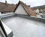 Flachdach Hausrückseite - 