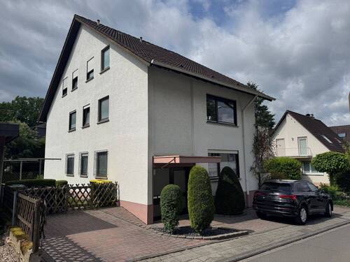 Straßenansicht 1 - Singlewohnung mit tollem Ausblick und spannendem Grundriss!