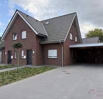 IMMOBILIEN GUMNIOR präsentiert: neuwertige Doppelhaushälfte in Emsbüren mit Garten und Carport