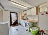 Waschküche mit Ausgang zum Garten - 