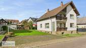 Seitenansicht - ORSCHOLZ: GERÄUMIGES WOHNHAUS 2 WOHNUNGEN TOP WOHNLAGE