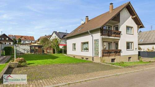 Seitenansicht - ORSCHOLZ: GERÄUMIGES WOHNHAUS 2 WOHNUNGEN TOP WOHNLAGE