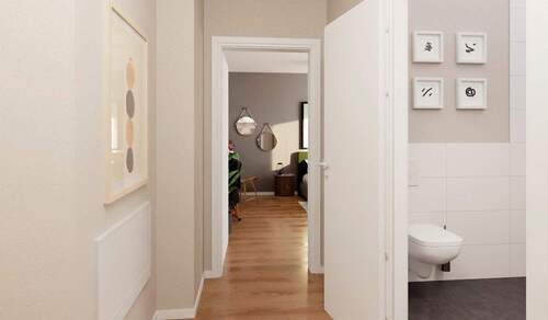 Der einladende Flur führt zu einem stilvollen Wohn - 