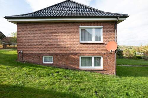 Seitenansicht - Einfamilienhaus mit 100,00 m² in Hemmoor zum Kaufen