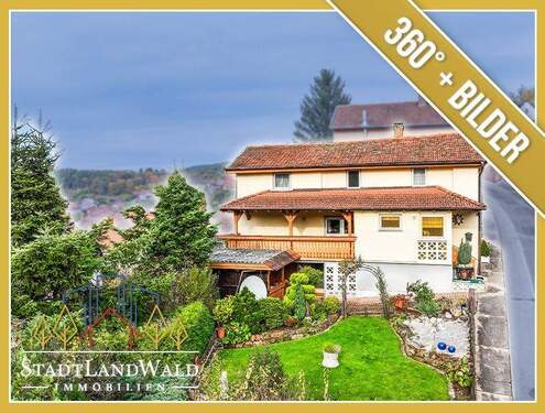 Titelbild - Exposé - Viel Platz mit Aussicht - Einfamilienhaus mit Garten, Balkonen & Garagen in Bundenthal