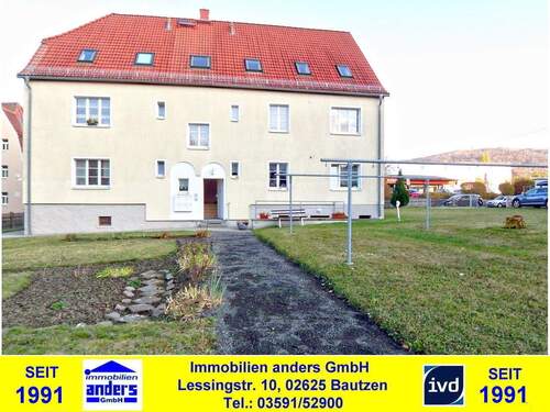 Hausansicht - Moderne 2-Raum-Wohnung mit gemeinschaftlichen Wiesengrundstück in Löbau