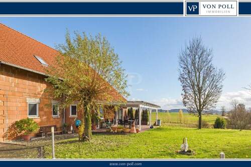 Titelbild - Landidylle genießen: Ebenerdiges Wohnen mit erholsamen Weitblick - Sofort bezugsfrei