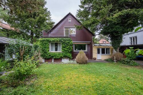 Gartenansicht - AIGNER - Ruhig gelegenes Einfamilienhaus mit großzügigem Garten in Hadern