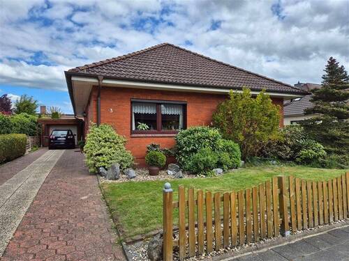 Ansicht - Attraktiver Bungalow mit schönem Garten in ruhiger Wohnlage