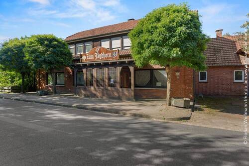 Bild 2 - 4 Zimmer Mehrfamilienhaus, Wohnhaus zum Kaufen in Diepholz