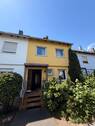 Reihenmittelhaus - Familienfreundliches Reihenmittelhaus mit Wintergarten, 5 Zimmern und 2 Garagen
