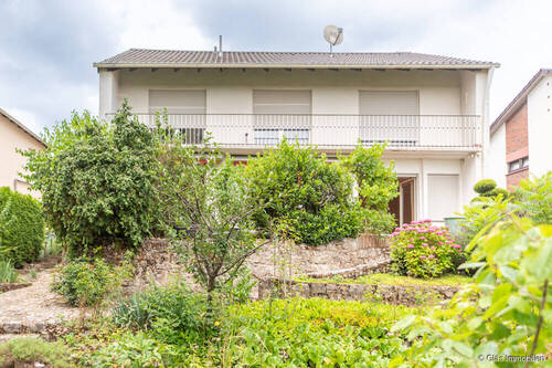 Gartenansicht - Einfamilienhaus mit 140,00 m² in Völklingen zum Kaufen