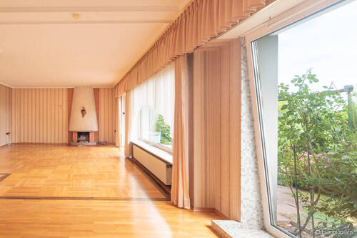 Wohn-/Esszimmer mit Kamin - 