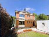 Gartenansicht - Mehrfamilienhaus, Wohnhaus mit 151,60 m&sup2; in Pulheim zum Kaufen