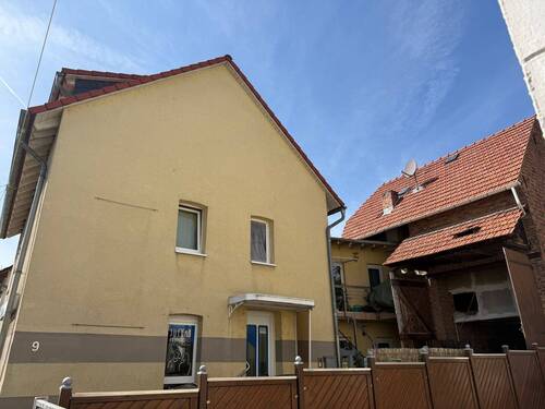 Hausansicht - Mehrfamilienhaus, Wohnhaus mit 129,00 m&sup2; in Brechen-Oberbrechen zum Kaufen