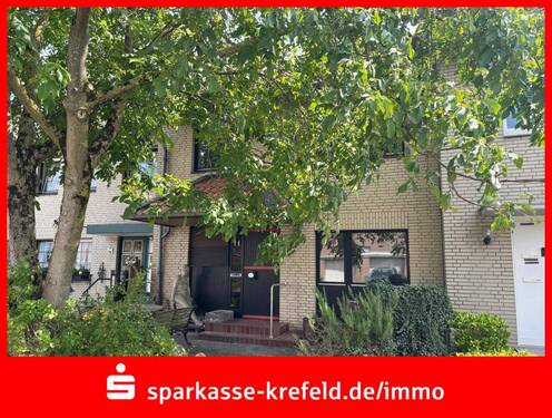 Außenansicht - Reihenmittelhaus mit Garage - 259.000,00 EUR Kaufpreis, ca.  157,00 m² Wohnfläche