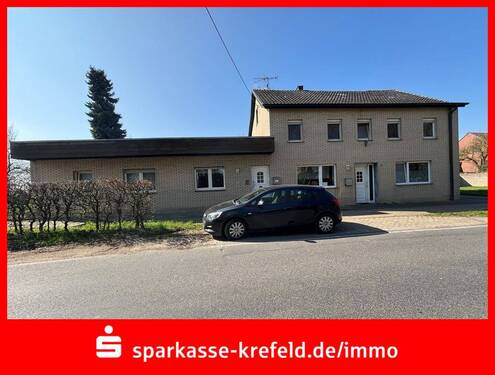 Frontansicht - Wohn- und Geschäftshaus mit Baugrundstück