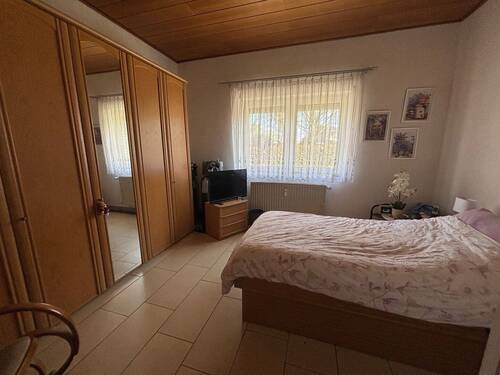 Schlafzimmer - Mehrfamilienhaus, Wohnhaus mit 310,00 m² in Schwalmtal zum Kaufen