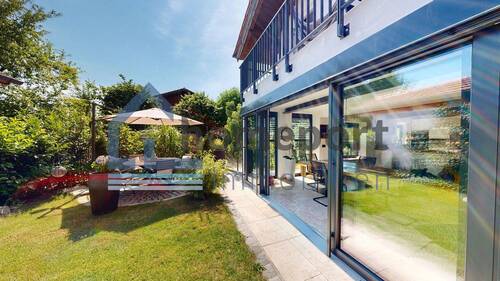 Garten - Tradition trifft auf Technik in Sauerlach-Arget: Designhaus mit Gartenparadies & Energieautarkie