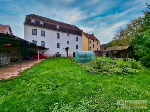 Rückseite vom Haus und Garten - Mehrfamilienhaus, Wohnhaus in Merseburg