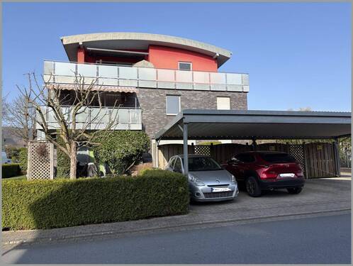 Bild 1 - gepflegte 2 Zi.-Eigentumswohnung mit Garten u. Carport