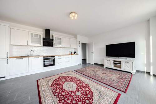 Küche - Eigentumswohnung mit Balkon und moderner Küche in zentraler Lage von Rhauderfehn