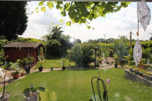 Wintergarten mit Blick aus dem Wohnzimmer - 