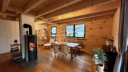 Bild 1 - *MODERNES BLOCKHAUS* Idyllisch gelegene Doppelhaushälfte mit Einliegerwohnung & traumhaftem Garten