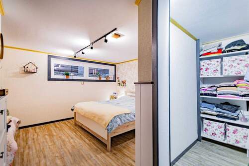 Schlafzimmer mit Ankleidezimmer UG - 