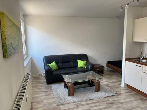Wohnen - Möbliertes 1 Zimmer-Appartement mit modernem Duschbad, 2. OG mit Aufzug, Außenstellplatz oder TG-Stellplatz optional
