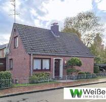 Familienfreundliches Einfamilienhaus mit großem Wintergarten und praktischer Garage in Krempe