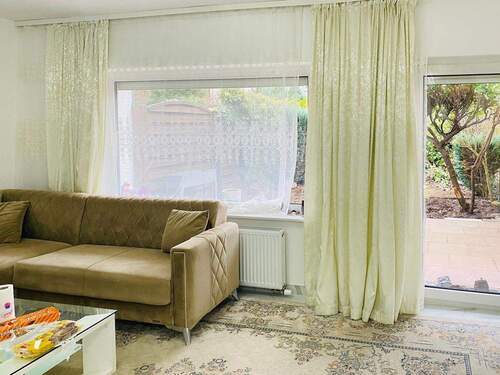 Wohnzimmer Erdgeschoss - 4 Zimmer Reihenmittelhaus zum Kaufen in Heusenstamm