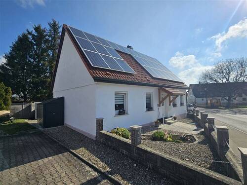 Ansicht Seite - Wie eine Wohnung nur besser - kleines Haus ohne Garten und mit Garage