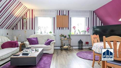 Wohnzimmer im Dachgeschoss - 