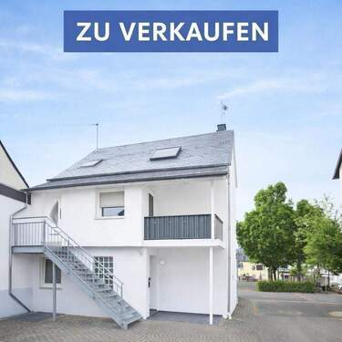 Familienfreundliches Haus mit Garage - 5 Zimmer Mehrfamilienhaus, Wohnhaus zum Kaufen in Kenn