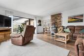 Wohnzimmer mit Kamin - Einfamilienhaus mit 169,00 m&sup2; in Mechernich zum Kaufen