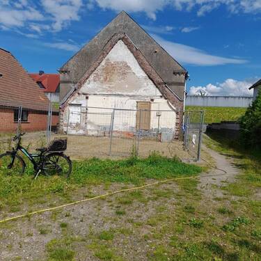 Rückansicht - 9 Zimmer Mehrfamilienhaus, Wohnhaus in Brake