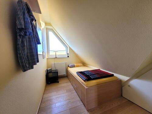 Schlafzimmer im Dachgeschoss - 